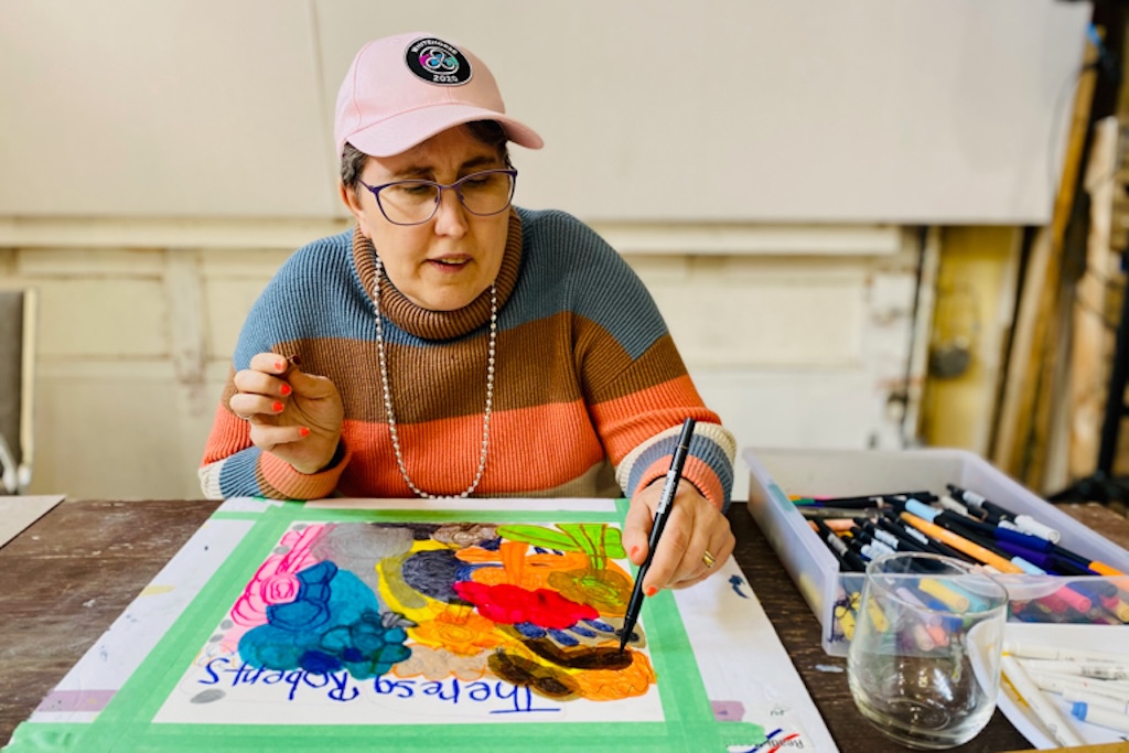 Theresa Roberts working at the TOZPAS studio